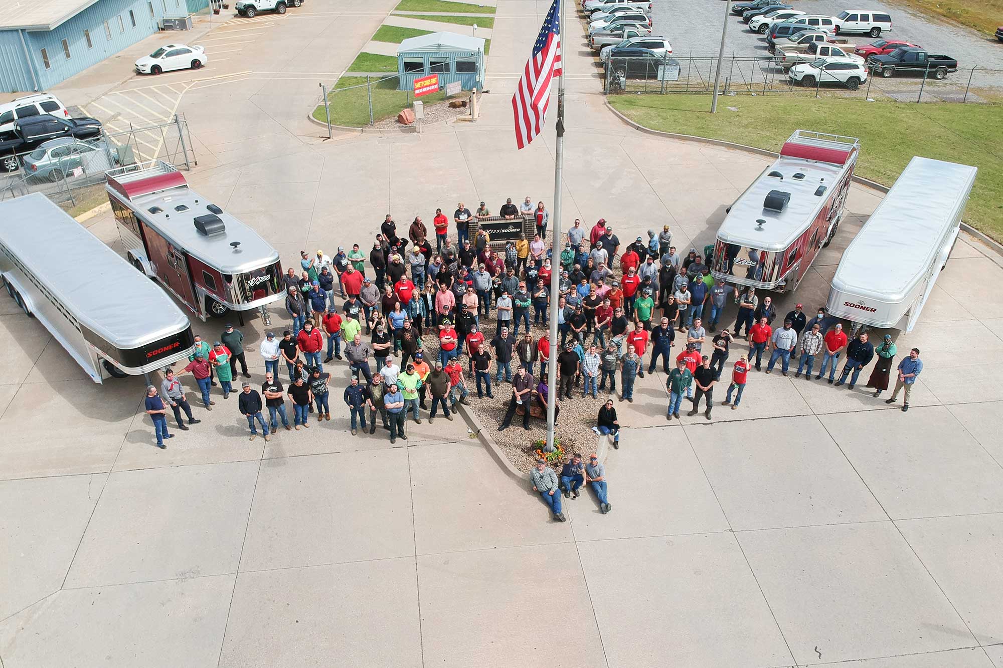 Livestock trailer award with employees