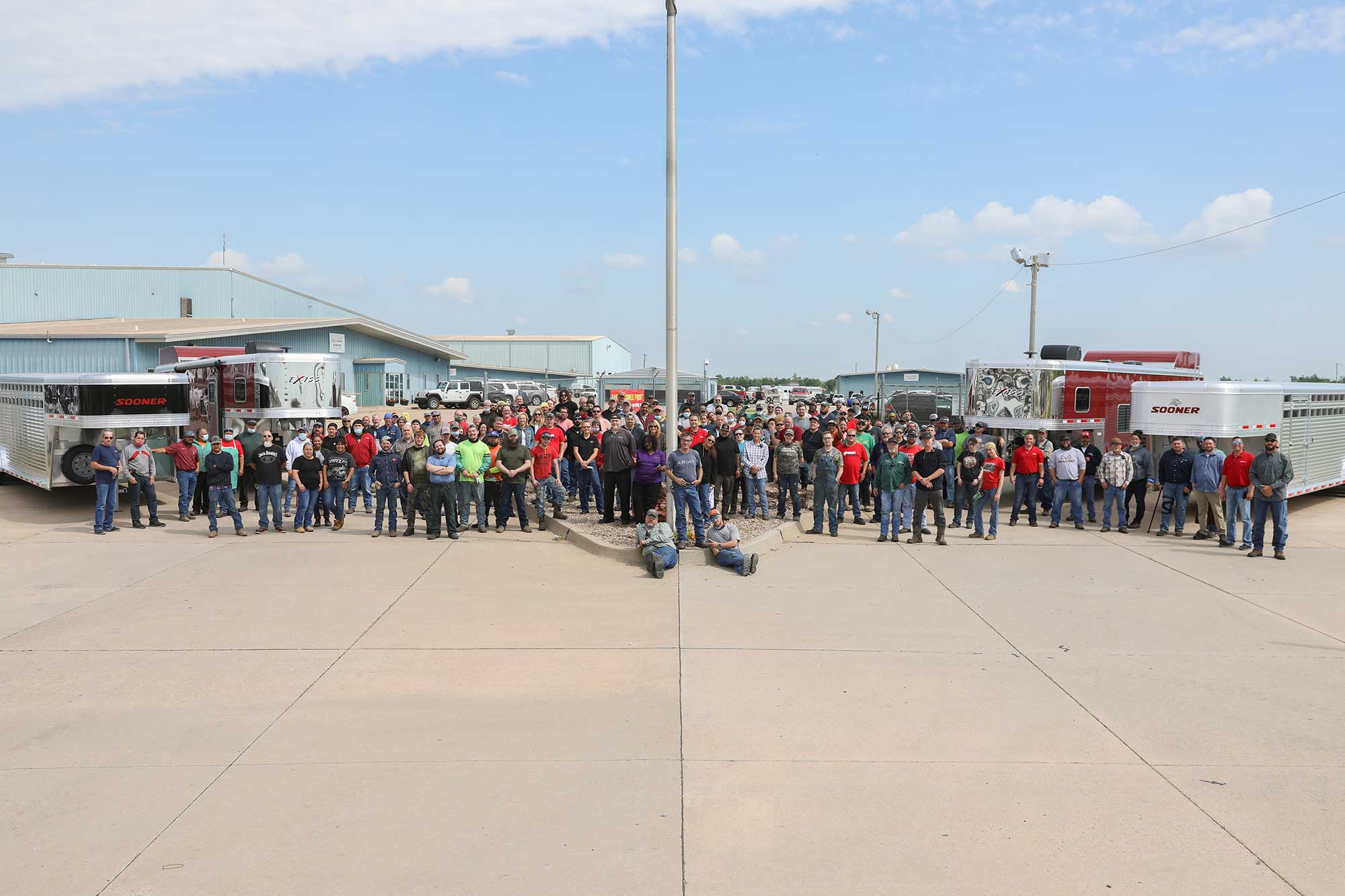 Livestock trailer award with employees