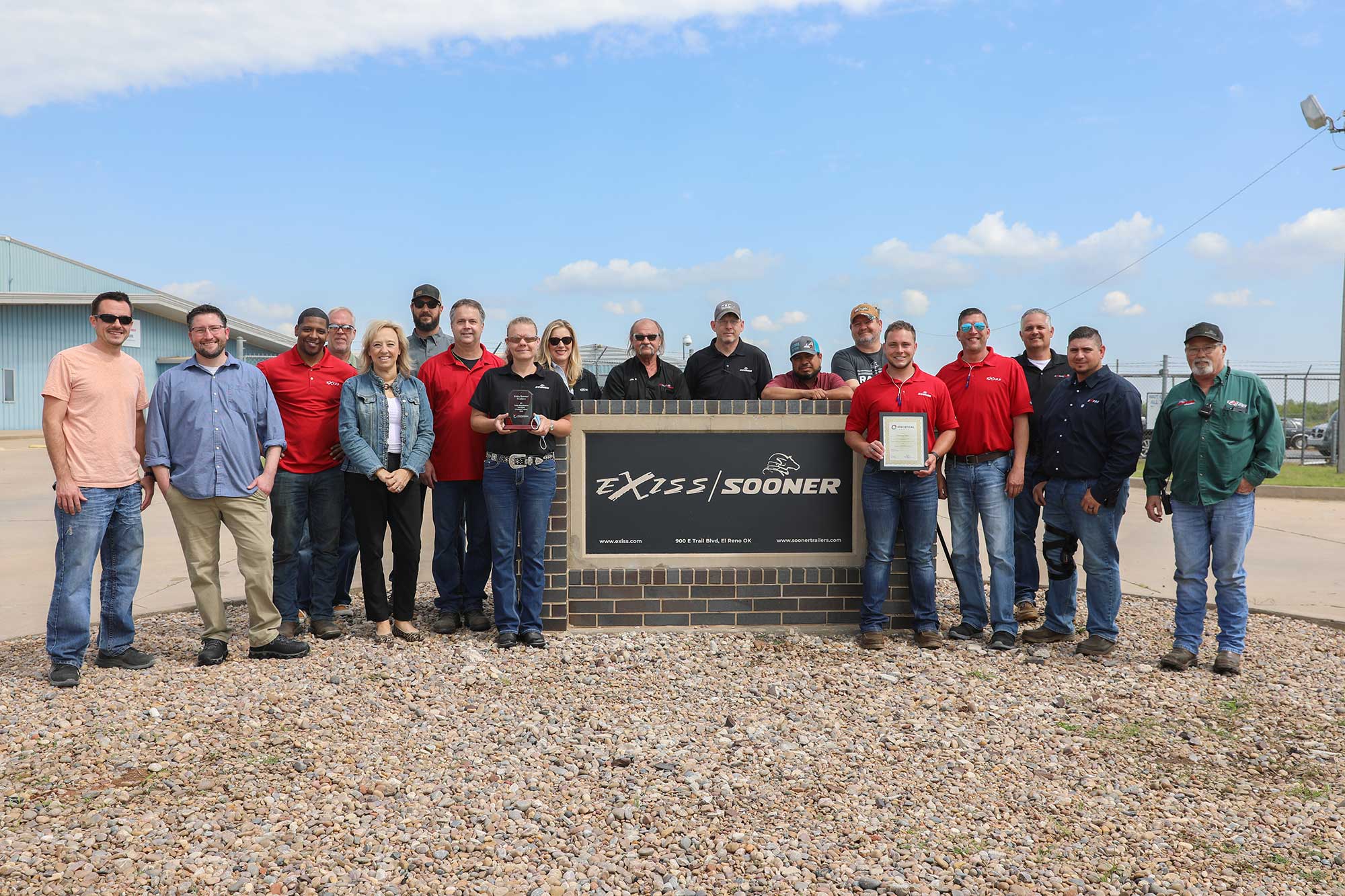 Livestock trailer award with employees